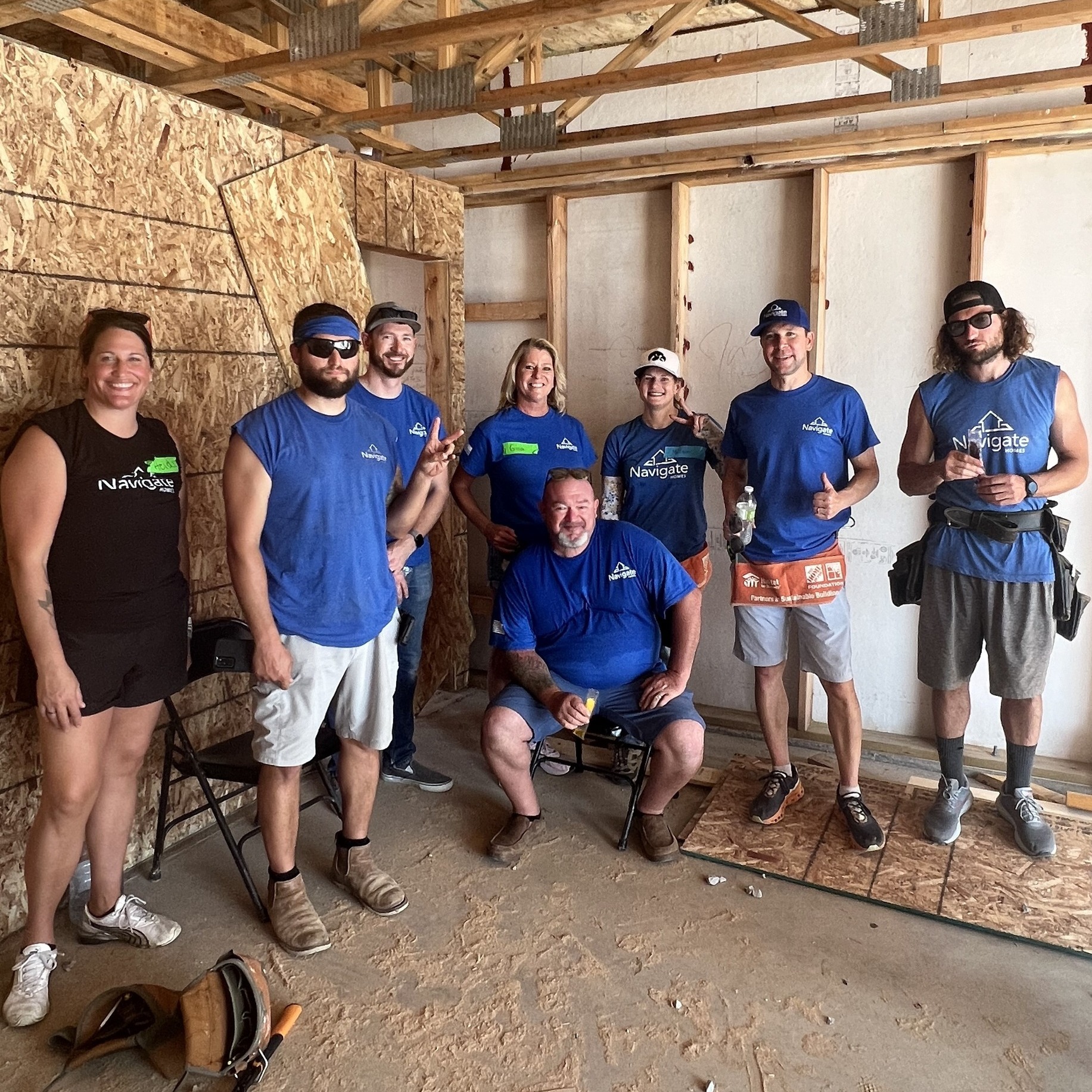 Navigate Homes team volunteering on a local Habitat for Humanity build